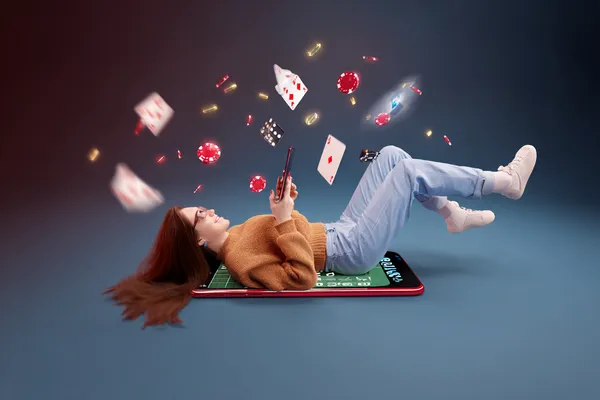 A glamorous woman holding casino chips in a neon-lit environment, representing the premium online casino atmosphere of ILOTBED.